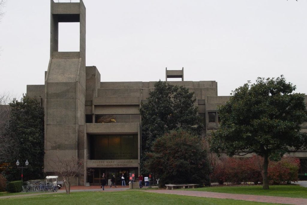 Exterior view of student and Lauinger Library, constructed in grey concrete in the brutalist style of architecture
