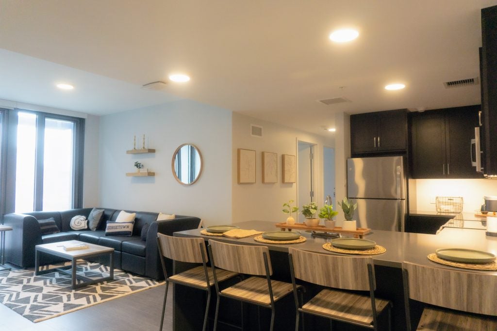 Kitchen and living room showcase for a Georgetown apartment at 55 H Street