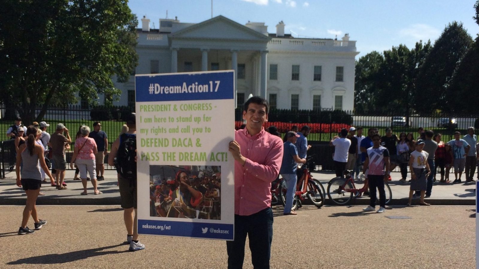 Abel Cruz Flores, a DACA recipient, holds a Dream Act sign in front of the White House