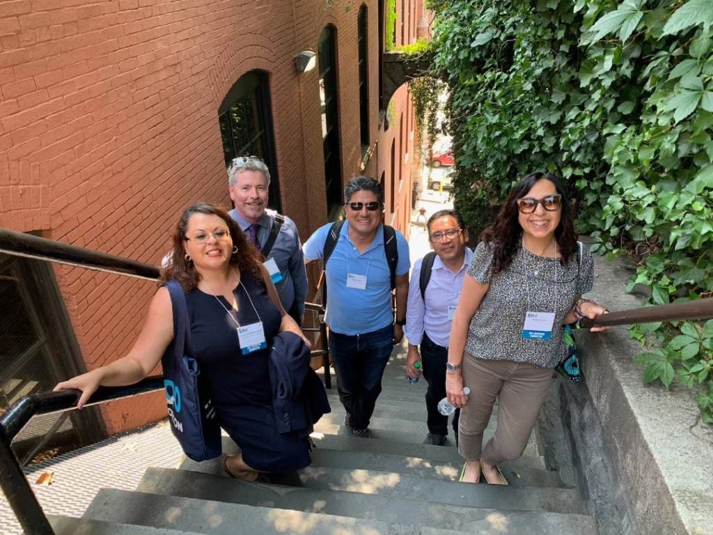 Current and former members of the ALD Executive Committee with seminar participants at the Exorcist Steps