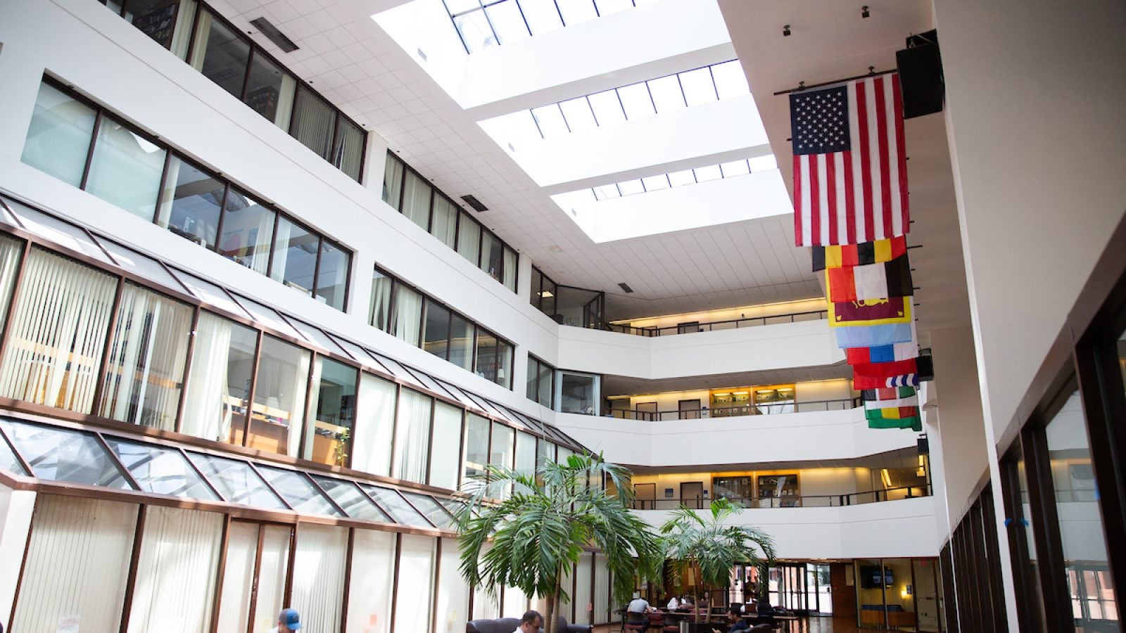 Intercultural Center building interior with skylight and various countries flags