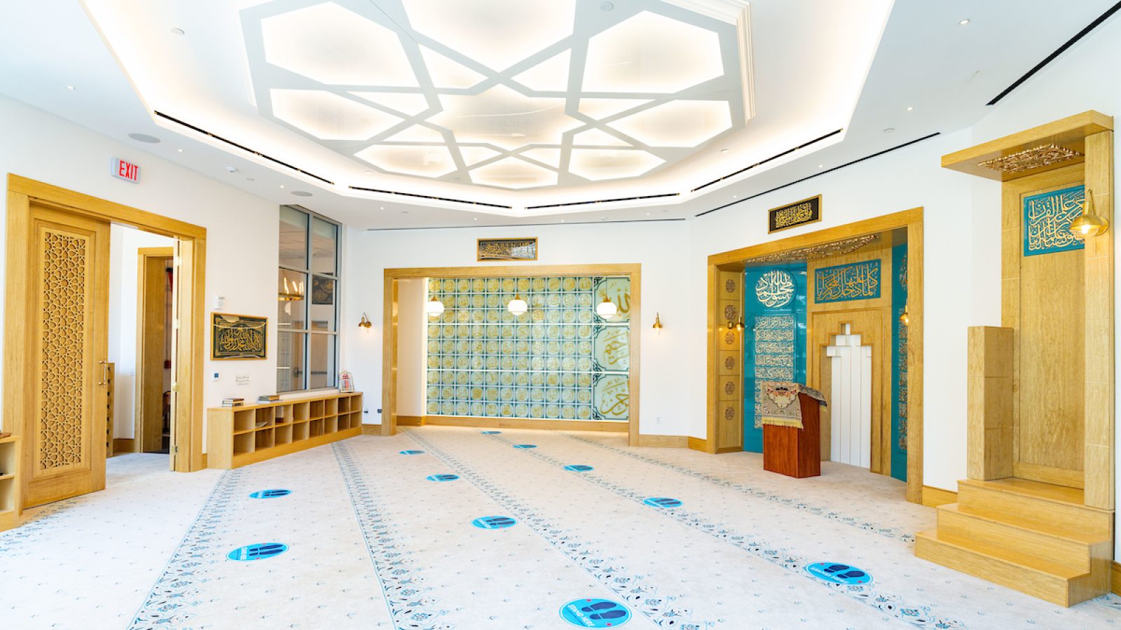 Inside the Yarrow Mamout Masjid the walls are lined with decorative gold and teal blue decor
