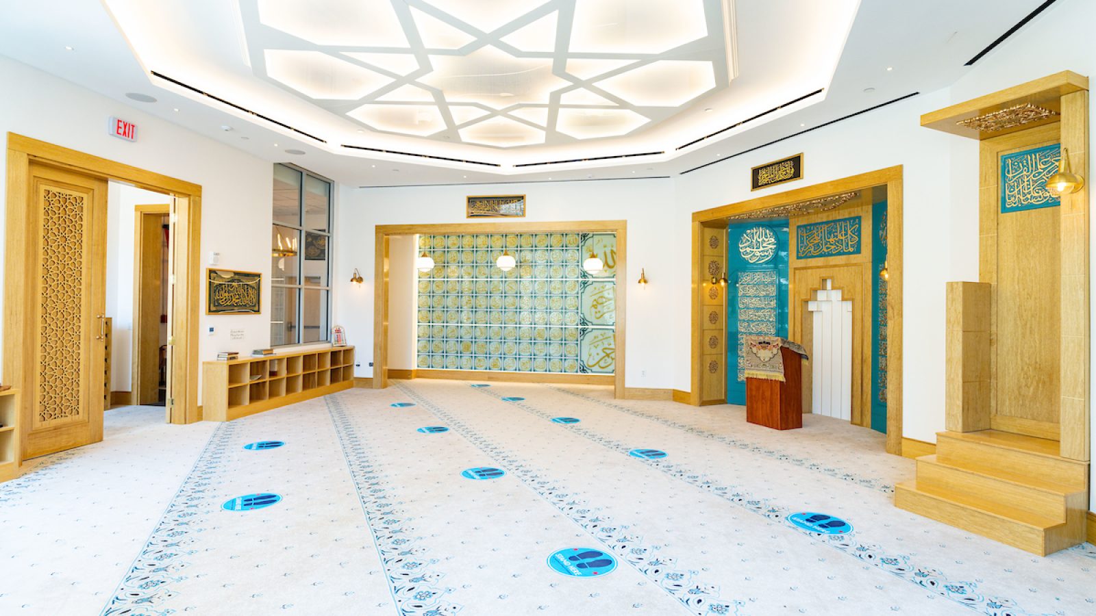 Inside the Yarrow Mamout Masjid the walls are lined with decorative gold and teal blue decor