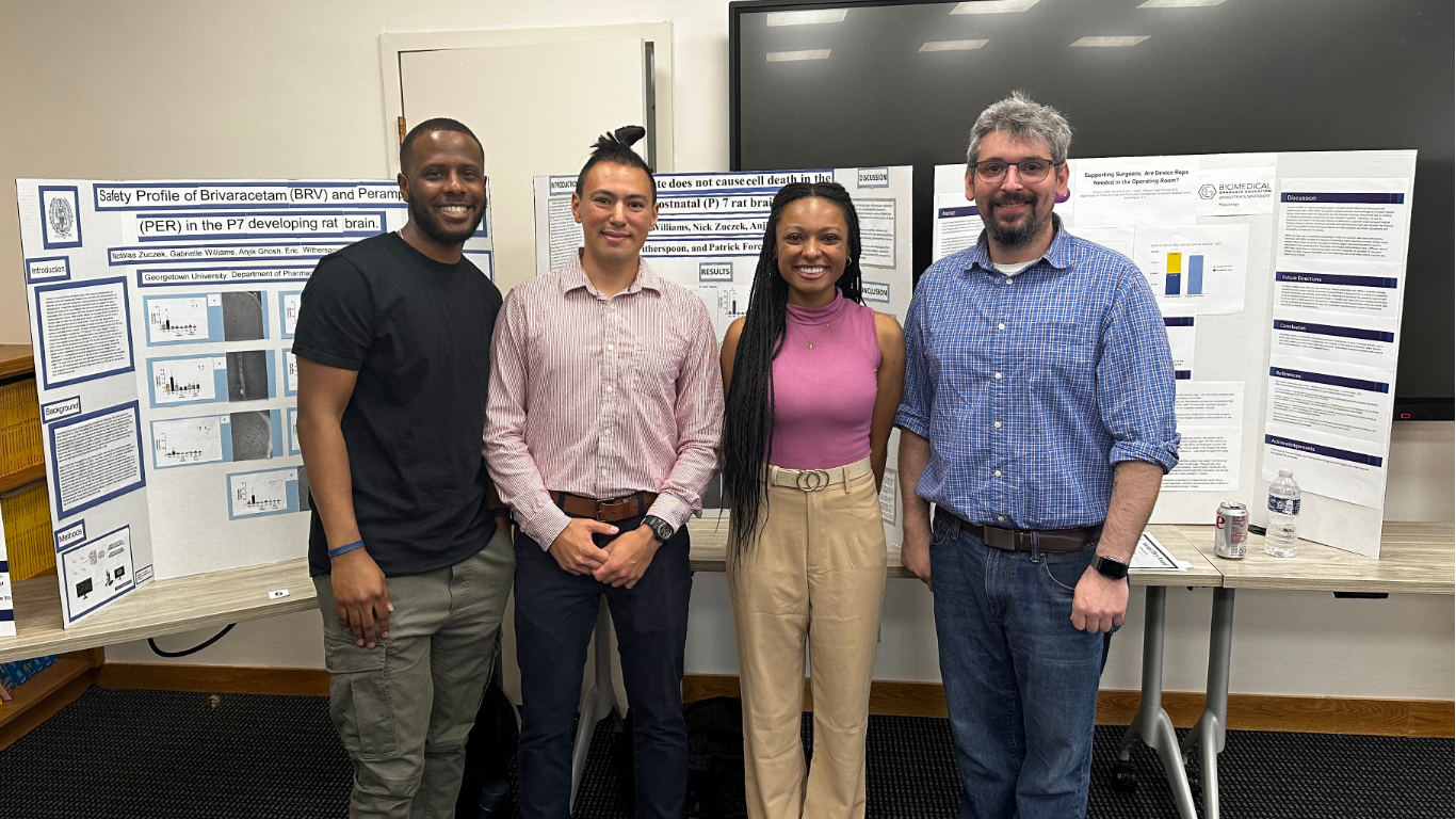 Gabbi Williams (center, right) with mentor and classmates at research event