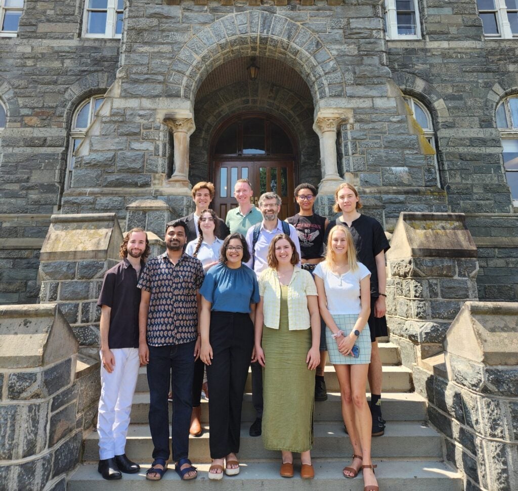 Hazbun (front, 2nd from right) with Ph.D. Government cohort and Director of Graduate Studies on the first day of class in front of Healy Hall