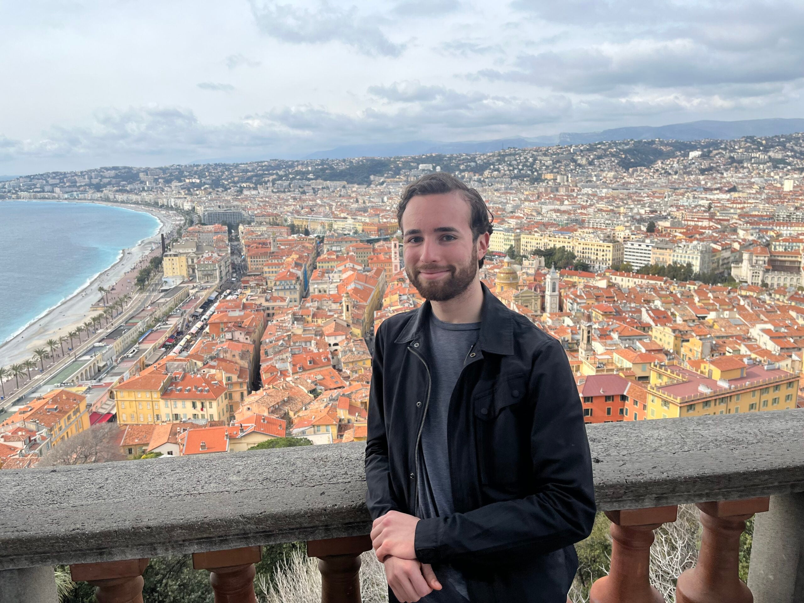 Alexander Rodriguez poses on a balcony in Nice, France, overlooking the city