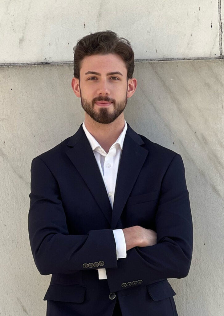 A headshot of Ethan Miller, a Georgetown master's candidate in applied economics.