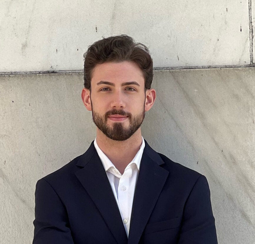 A headshot of Ethan Miller, a Georgetown master's candidate in applied economics.