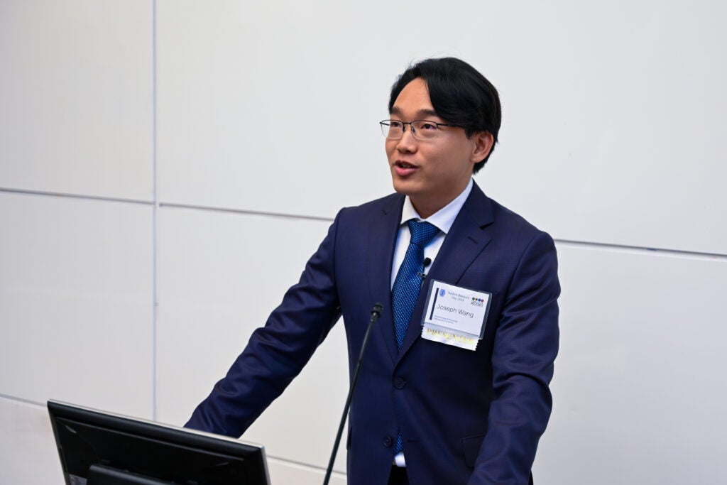 Joseph Wang gives a presentation during Student Research Day.