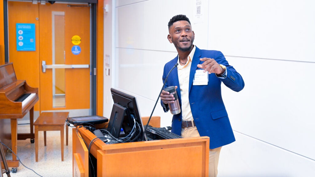 Makheni Jean-Pierre delivers an oral presentation during Student Research Day.