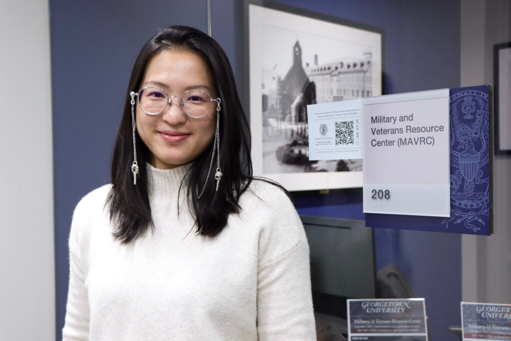Rachel Jin stands in front of the Military and Veterans Resource Center (MAVRC).