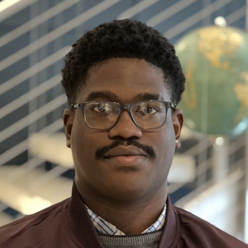 A headshot of Geraud Bisimwa.