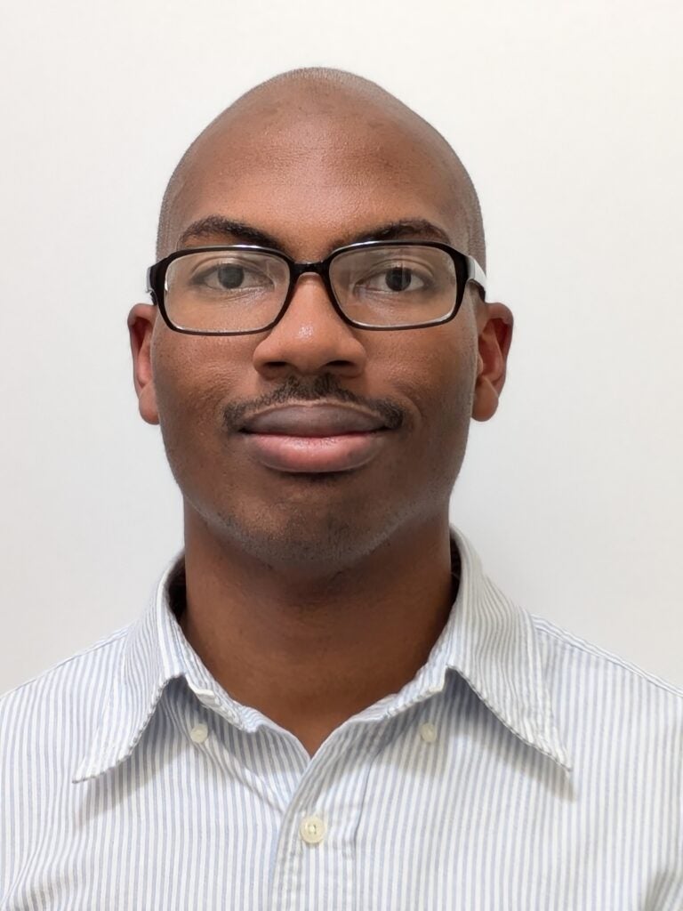 A headshot of Georgetown graduate student Darrian Mills