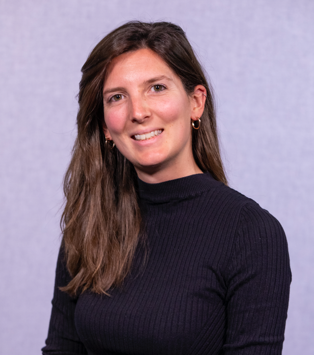 A headshot of Maude Havenne, a woman wearing a black shirt, against a light purple background.
